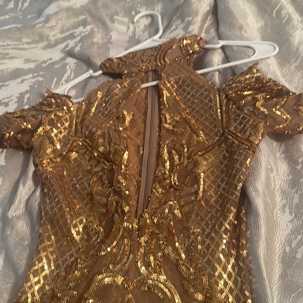 This dress fits bomb. Cut out in front bronze wore 1